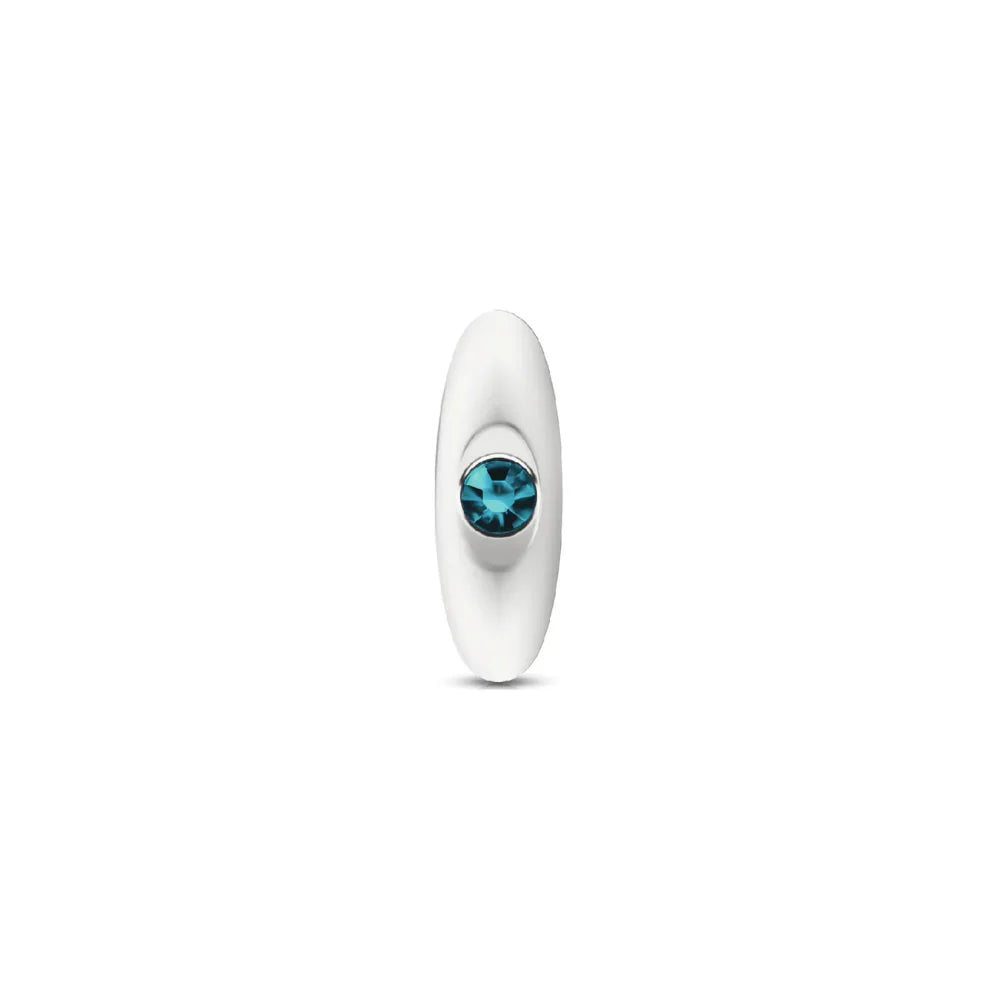 Silver butt plug with a blue gemstone on a white background