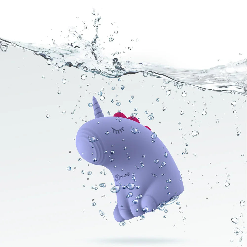 Purple narwhal toy with a unicorn horn in water