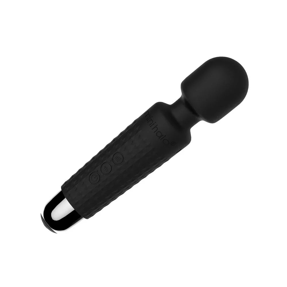 Black handheld vibrator with a metallic tip on a white background