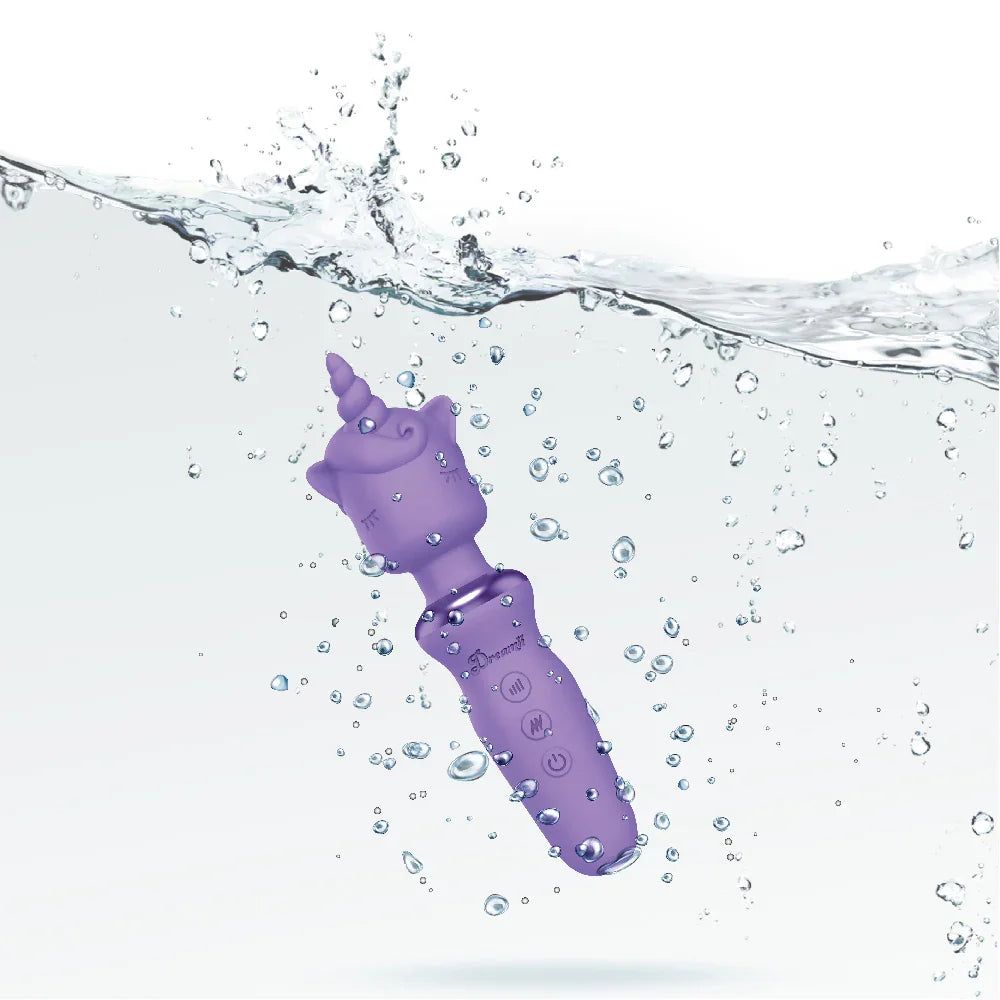 Purple unicorn-shaped toy submerged in water with bubbles