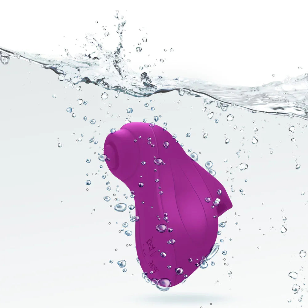 Purple toy partially submerged in water with bubbles and splashes.