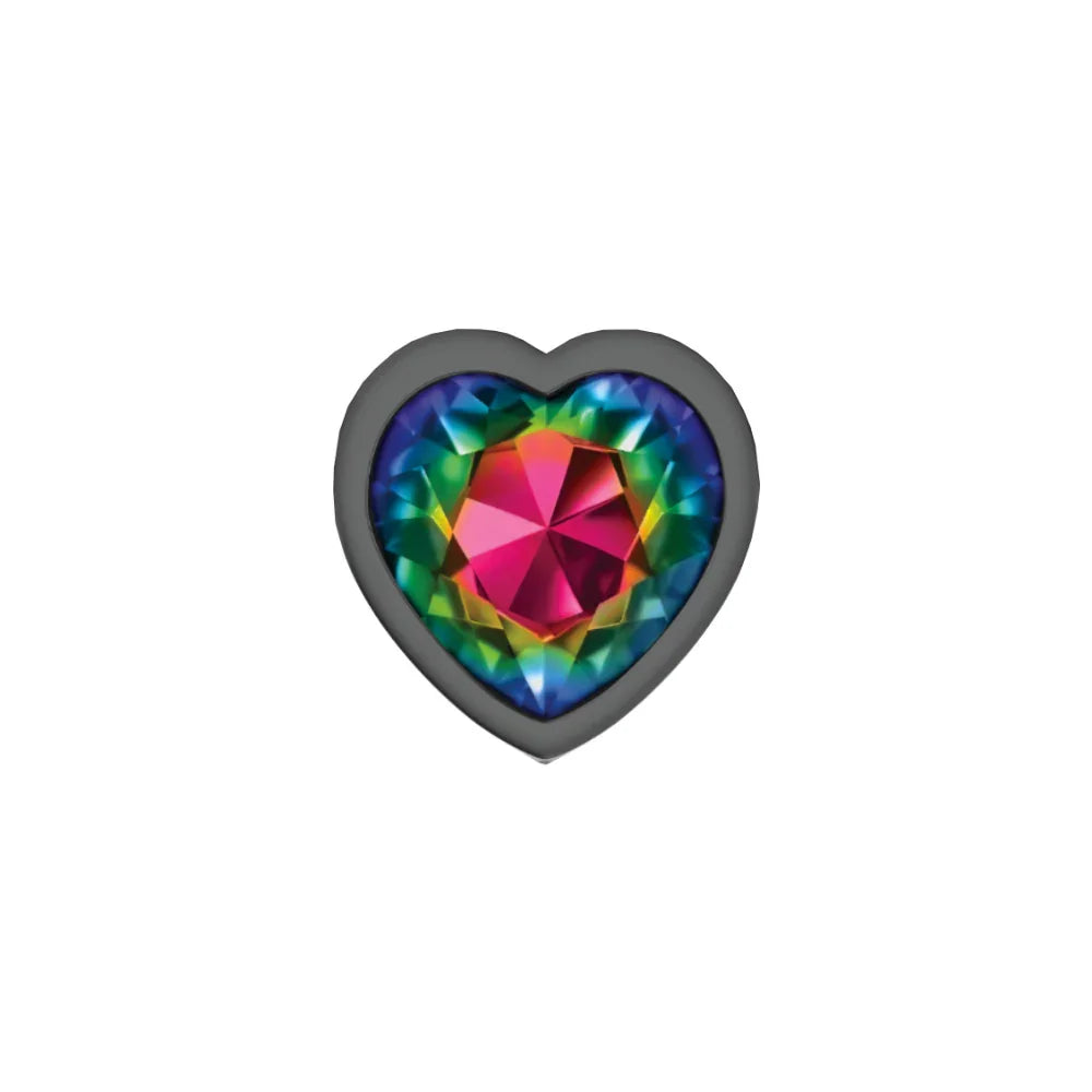 Heart-shaped object with a colorful gem-like center on a white background