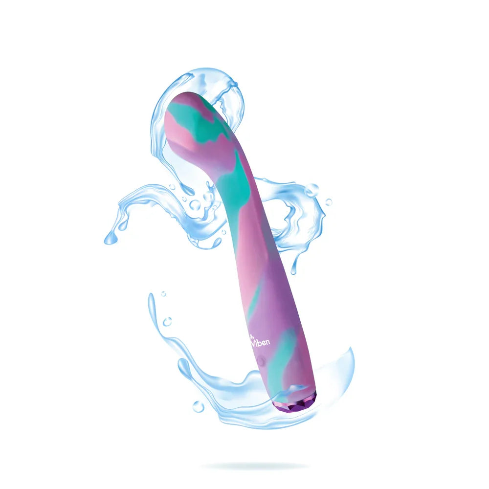 Colorful massager with water droplets on a white background