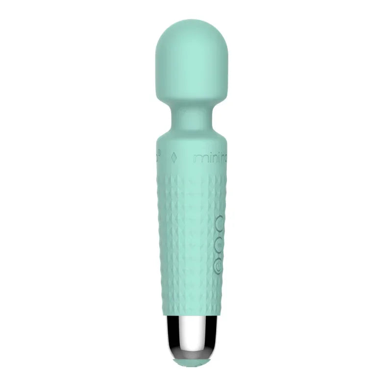 Mint green handheld massager on a white background