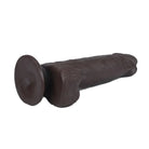 Dark brown dildo on a white background