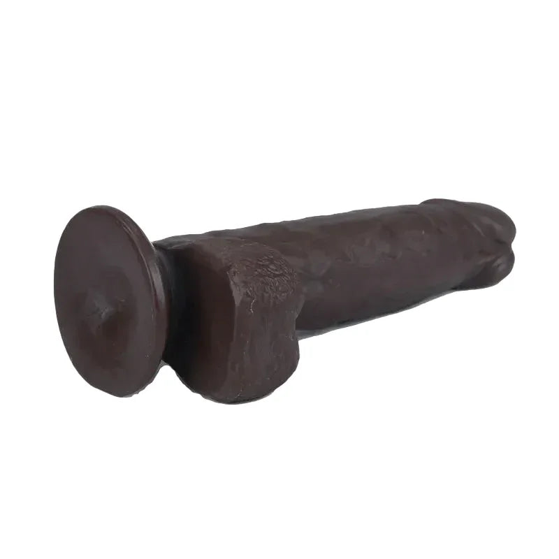 Dark brown dildo on a white background