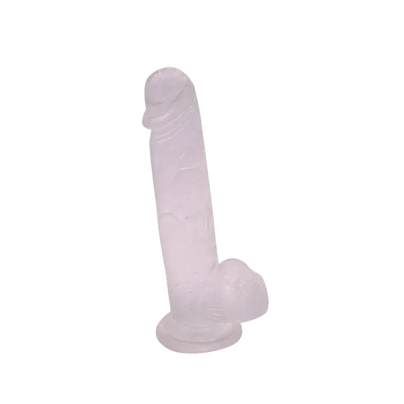 Clear silicone dildo on a white background