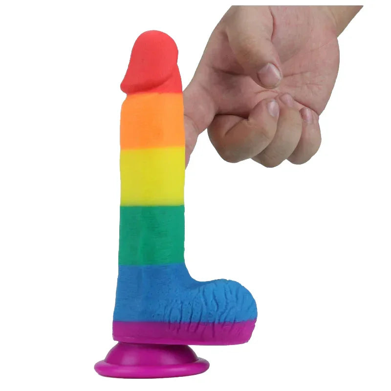 Colorful silicone dildo with rainbow pattern on a white background