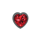 Heart-shaped red gemstone with black border on a white background