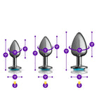 Set of three metallic butt plugs with size measurements on a white background
