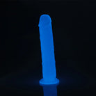 Blue silicone dildo on a black background