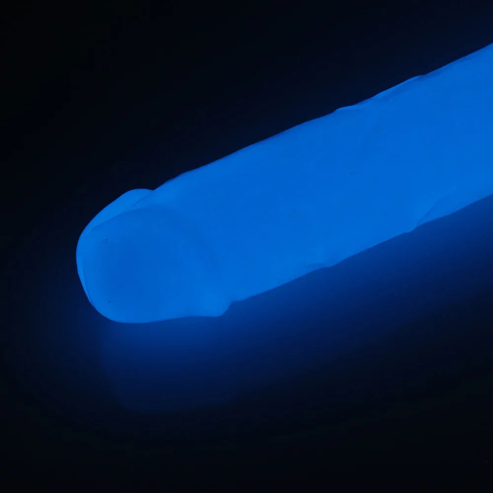 Blue glowing dildo against a black background