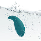 Viben Elated Teal vibrator partially submerged in water with bubbles and ripples.