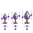 Set of metallic butt plugs with size measurements on a white background