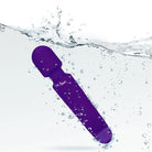 Purple electronic wand massager with 'Viben' branding submerged in water, surrounded by bubbles.