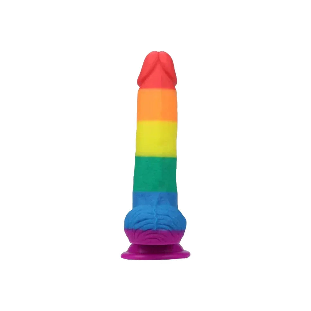 Rainbow-colored silicone dildo on a white background