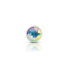 Multicolored gemstone in a silver setting on a white background